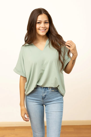 The cara sea foam green top